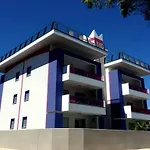 Sunny Terrace And Modern Comforts By The Pool Apartment