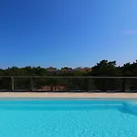 Apartment Sunny Terrace And Modern Comforts By The Pool