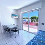 Sunny Terrace And Modern Comforts By The Pool Apartment
