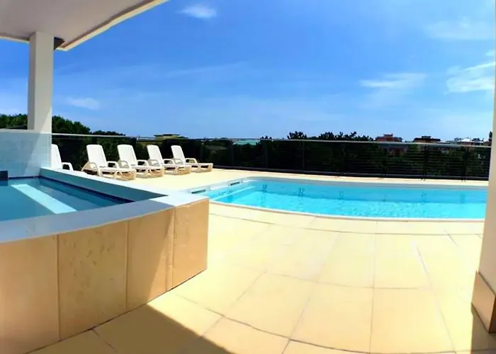 Sunny Terrace And Modern Comforts By The Pool Apartment *